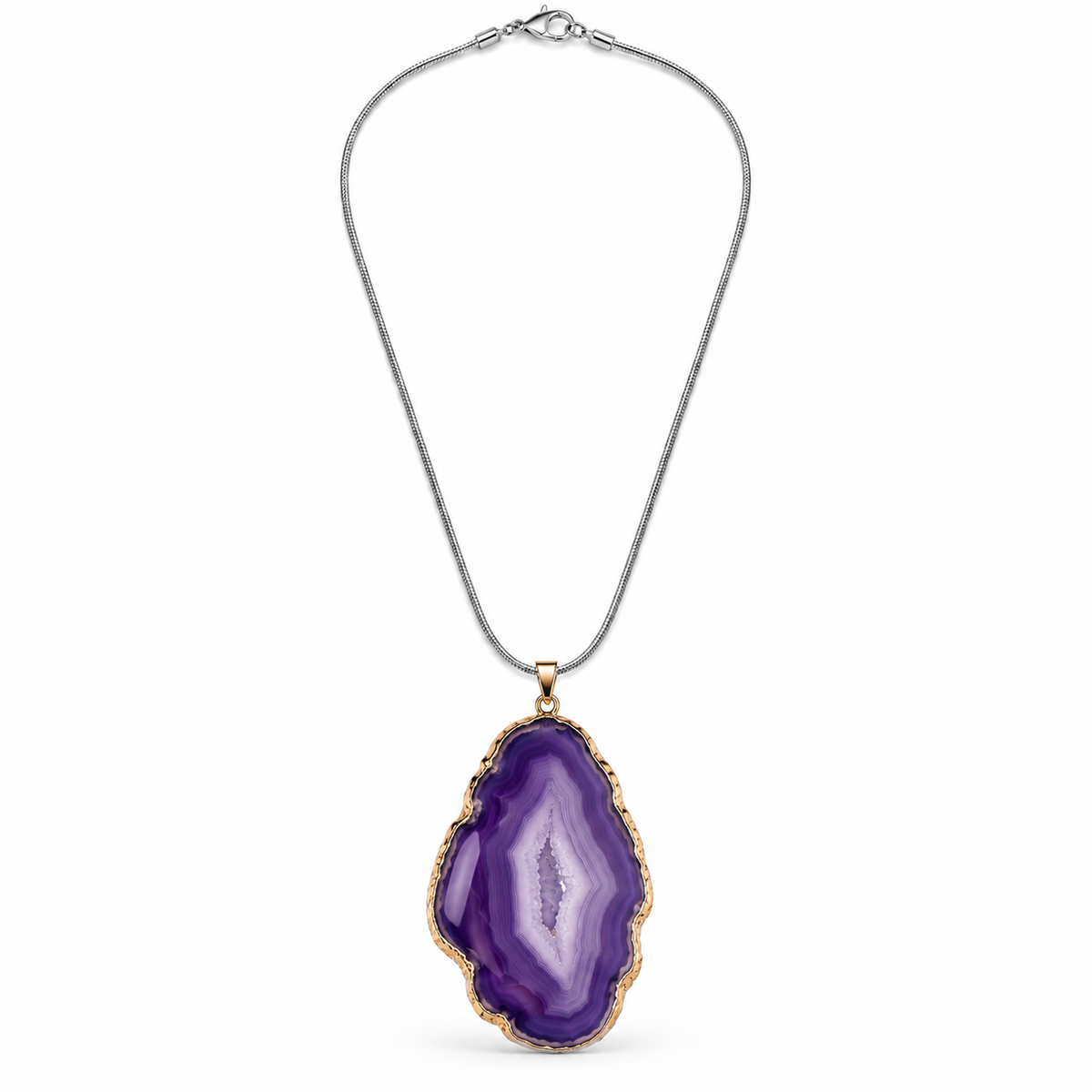 Purple agate slice pendant necklace with gold-tone edging on a silver-tone snake chain